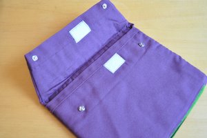 Pochette iPad - les boutons pressions 